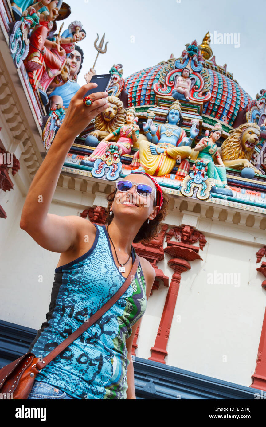 Tourists in Sri Mariamman hindu temple. Chinatown district. Singapore, Asia. Stock Photo