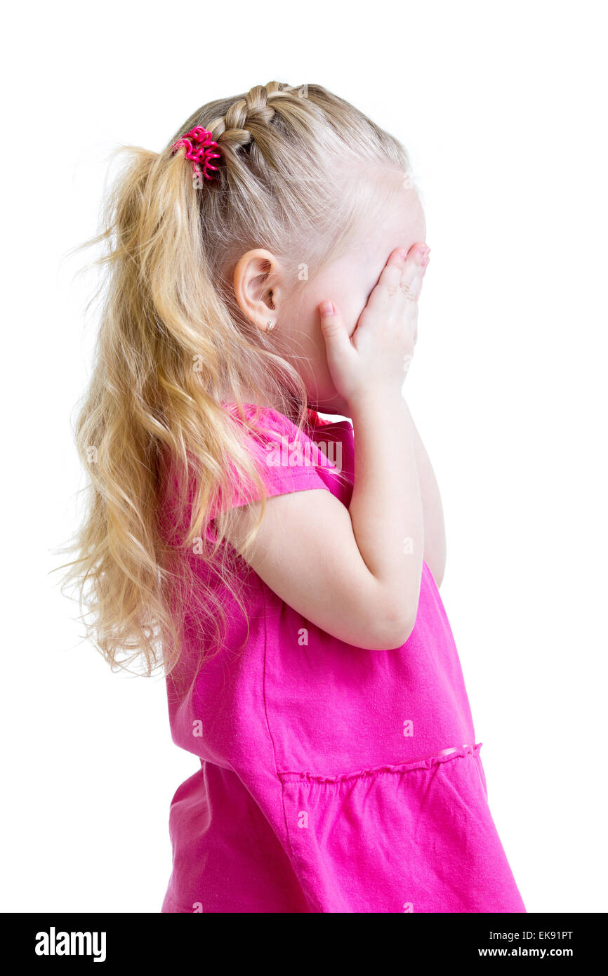 kid girl cover her face with her hand isolated Stock Photo - Alamy