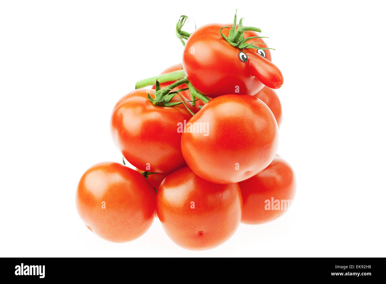 bunch of tomatoes isolated on white Stock Photo - Alamy