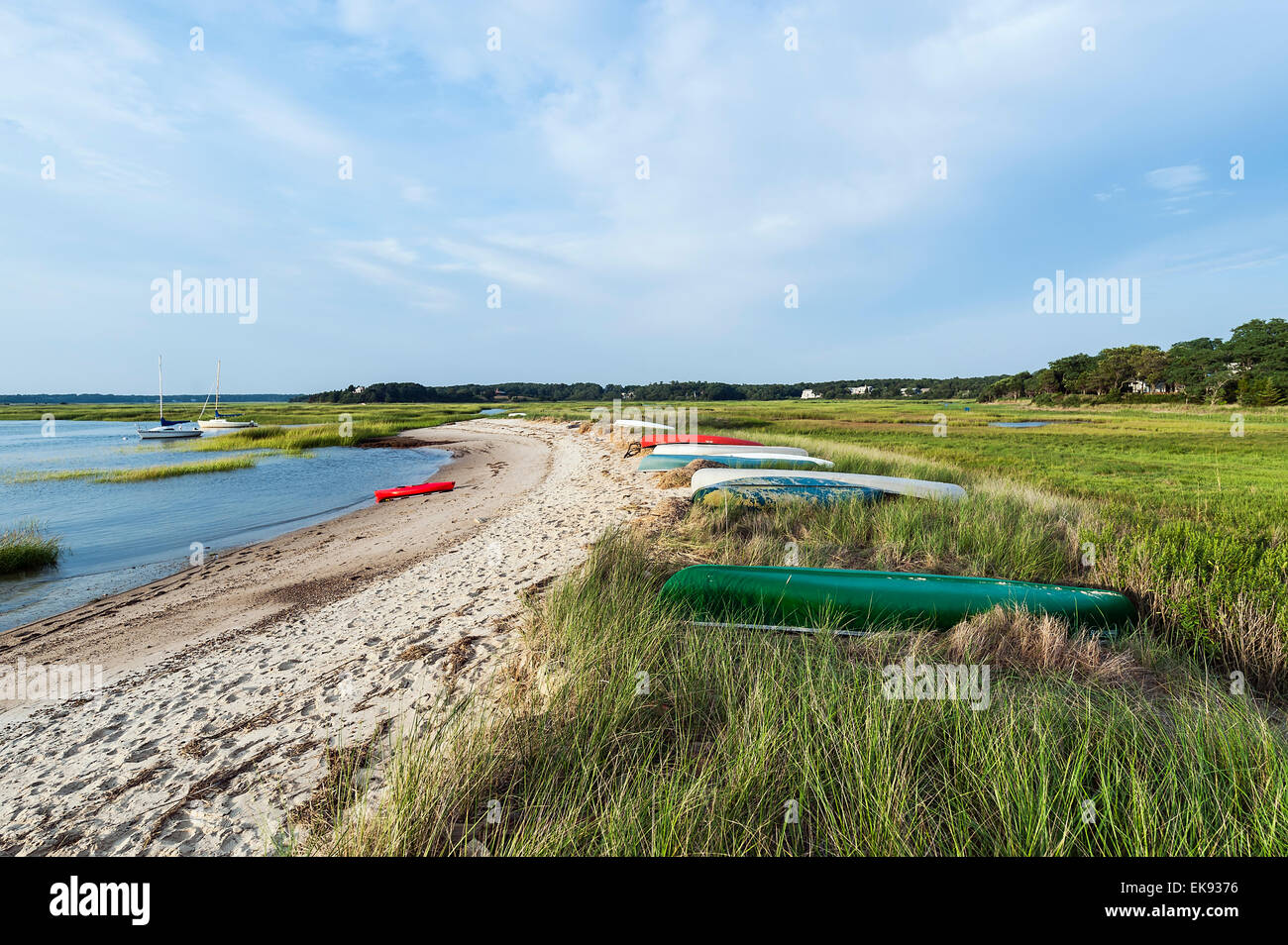 Canoes lined up on Boat Meadow Beach, Eastham, Cape Cod, Massachusetts, USA Stock Photo