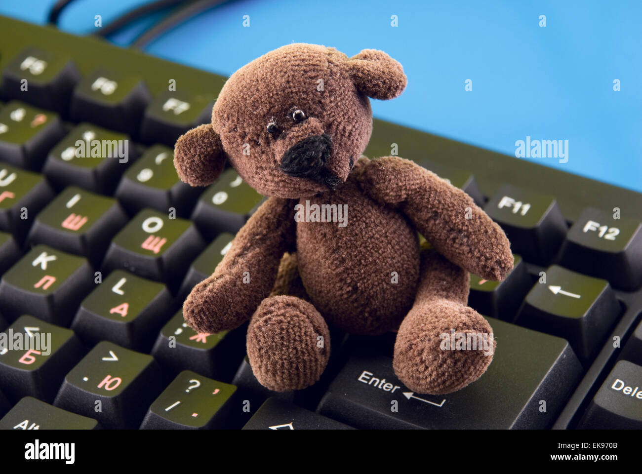 toy on the computer keyboard Stock Photo