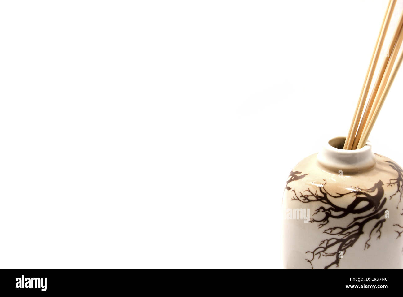 sticks in a vase isolated on white Stock Photo Alamy