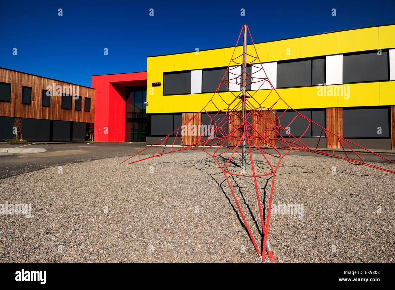 Bright yellow and red building, Kirkenes school, Finnmark, Norway ...