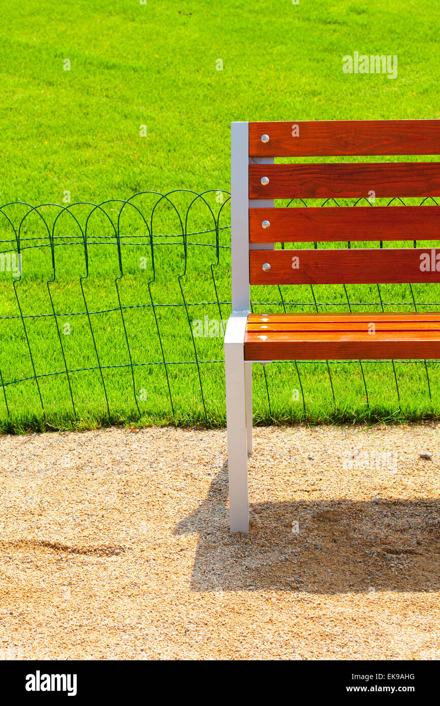 lonely bench in the park Stock Photo Alamy