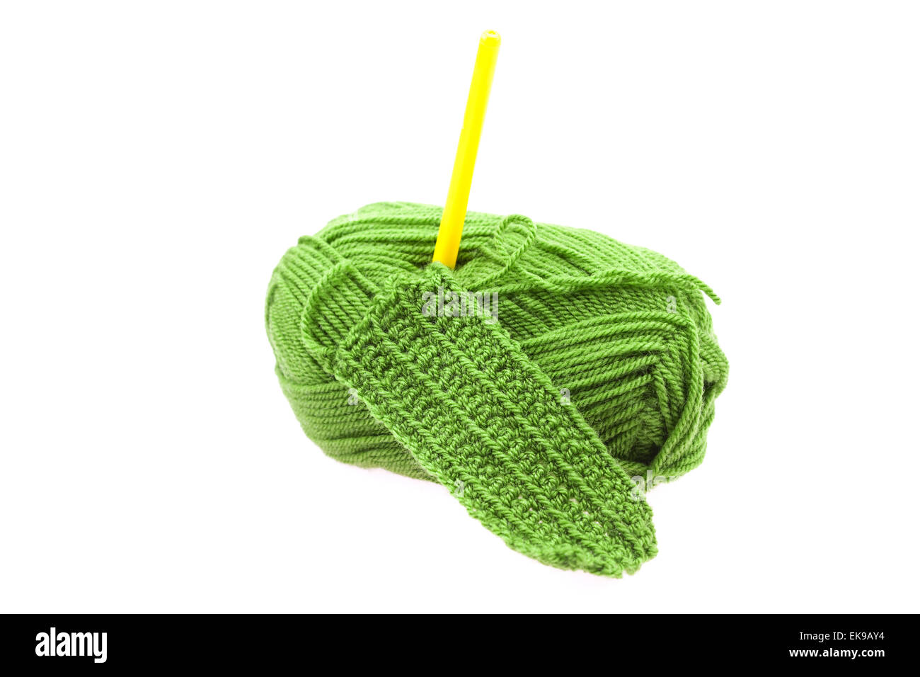 Skein of wool, crochet hook and knitted piece isolated on white Stock ...