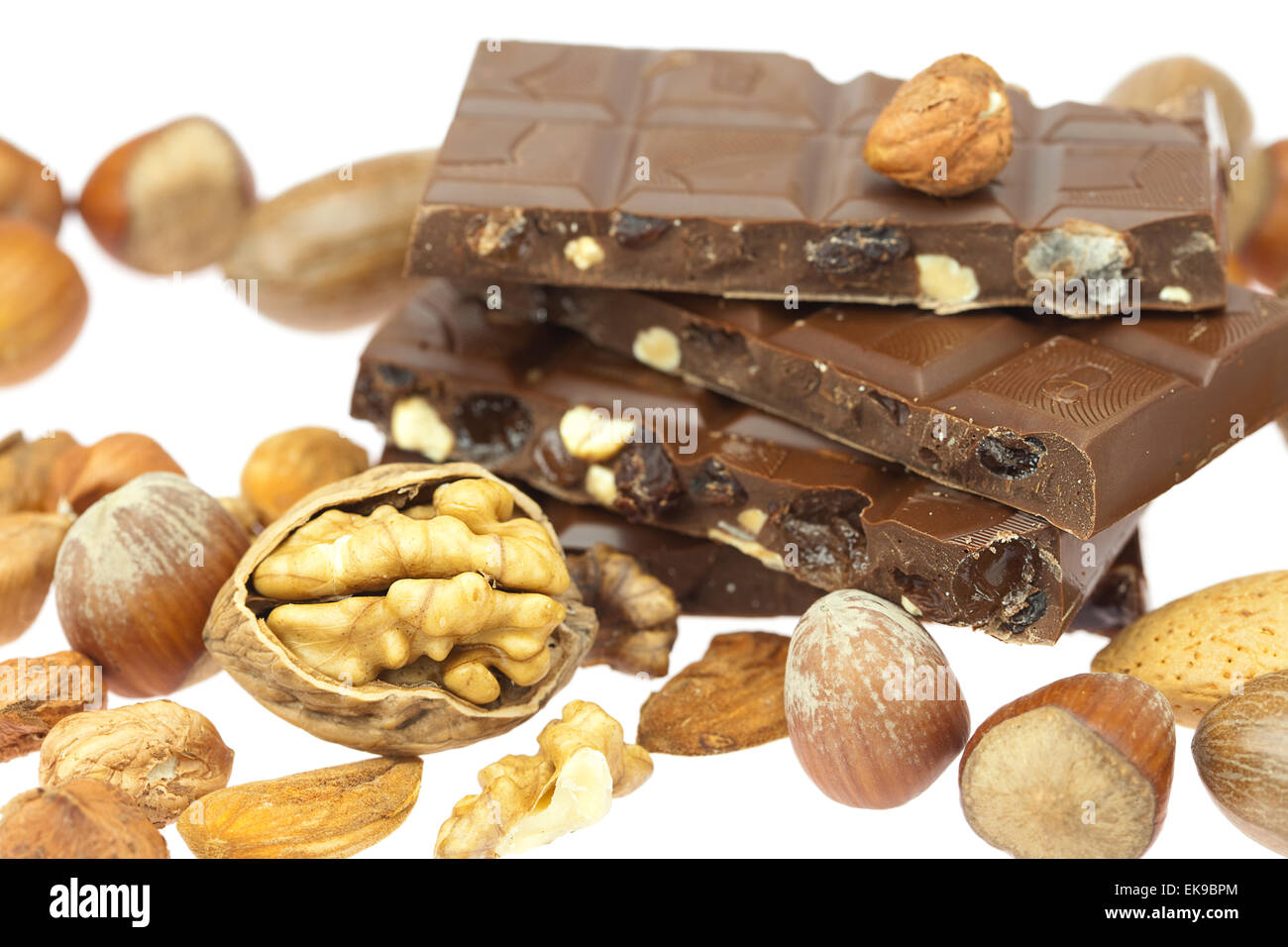 chocolate bar and nuts isolated on white Stock Photo Alamy