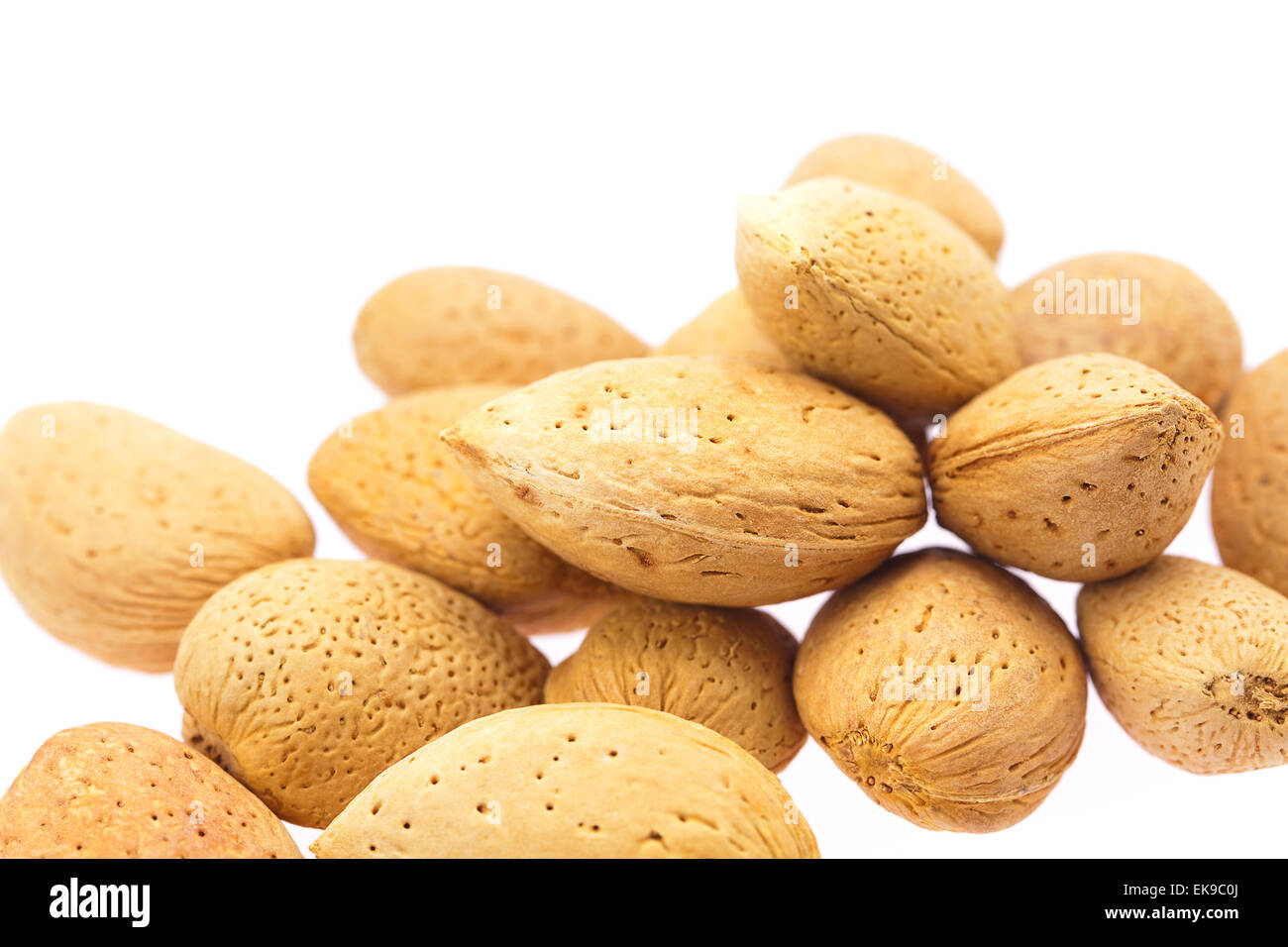almonds isolated on white Stock Photo - Alamy