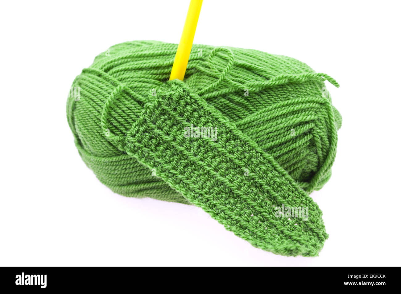 Skein of wool, crochet hook and knitted piece isolated on white Stock ...