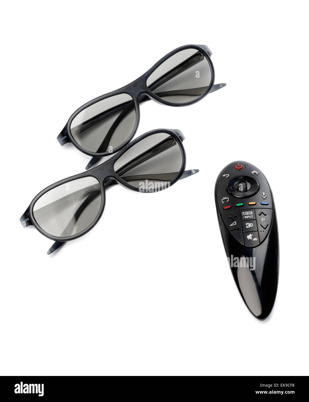 Two pairs of 3D glasses and remote control TV. Isolate on white Stock
