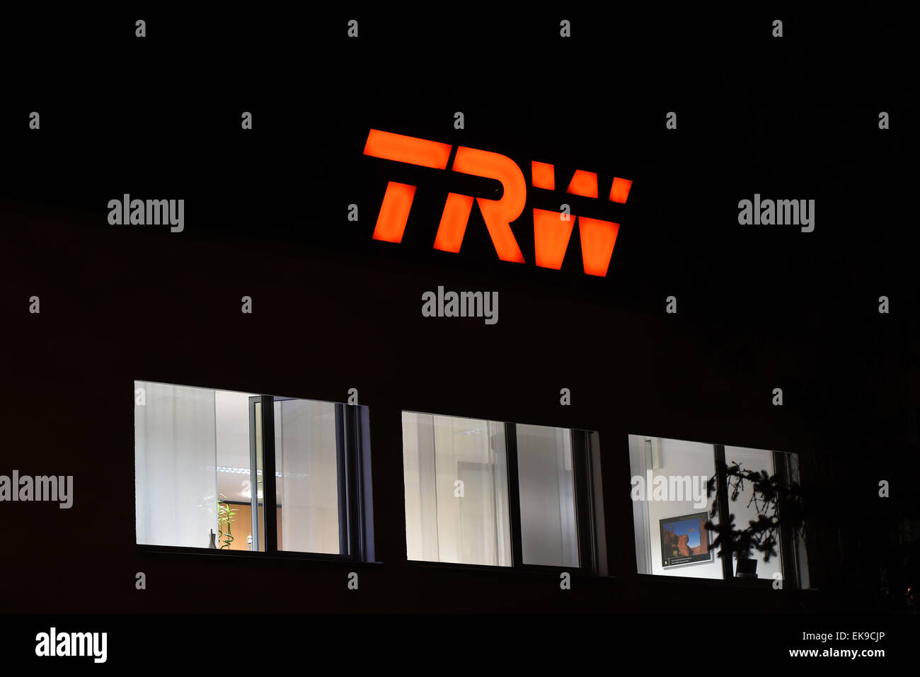 Radolfzell, Germany. 09th Mar, 2015. The logo of the US supplier TRW Automotive shines at the factory site in Radolfzell, Germany, 09 March 2015. The supplier ZF faces a billion dollar acquisition: The company takes over the US supplier TRW Automotive. Through this step the company becomes one of the largest suppliers worldwide. Photo: Felix Kästle/dpa/Alamy Live News Stock Photo