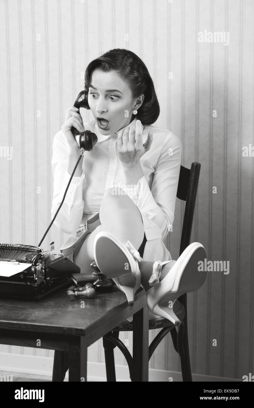 Retro office worker with surprised expression Stock Photo