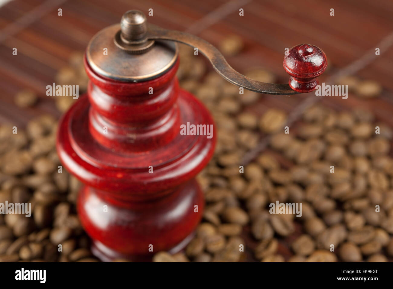 coffee grinder and coffee beans on a bamboo mat Stock Photo Alamy