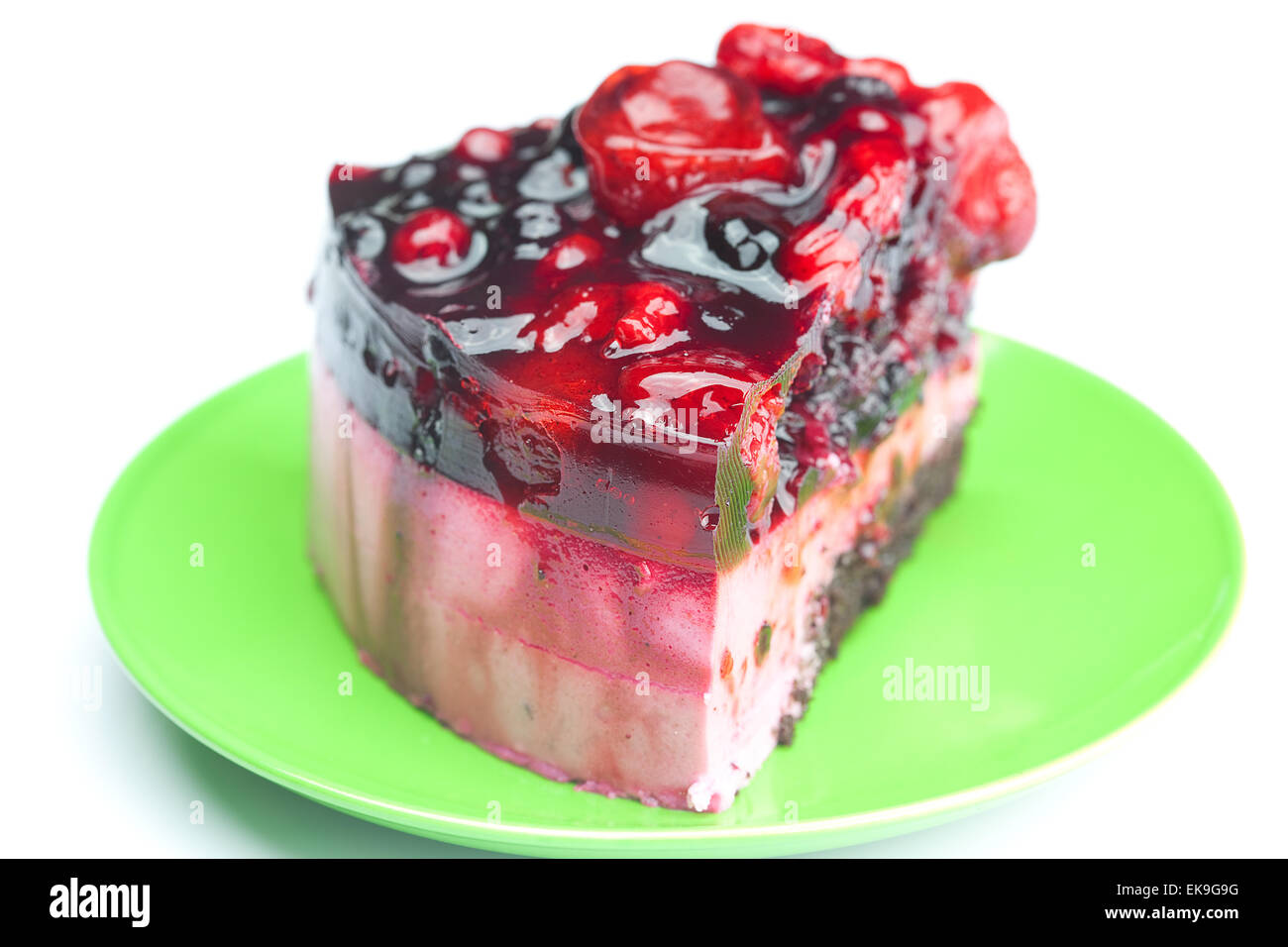 beautiful cake with berries on a plate isolated on white Stock Photo ...