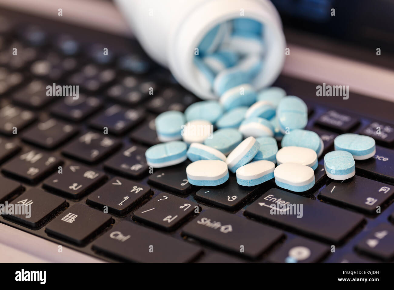 Medicine concept computer keyboard pill hires stock photography and