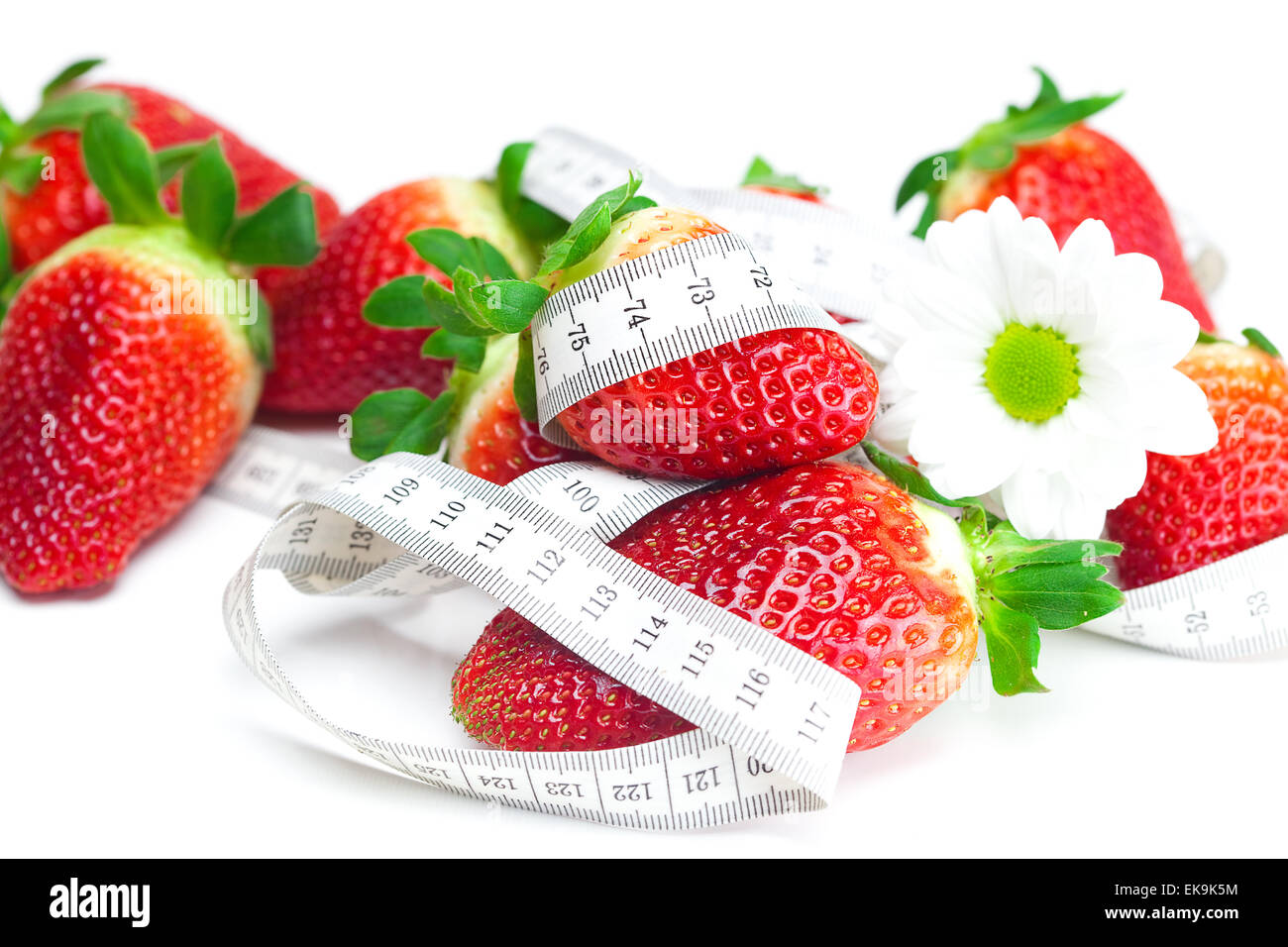 background of red big juicy ripe strawberry and flower Stock Photo - Alamy