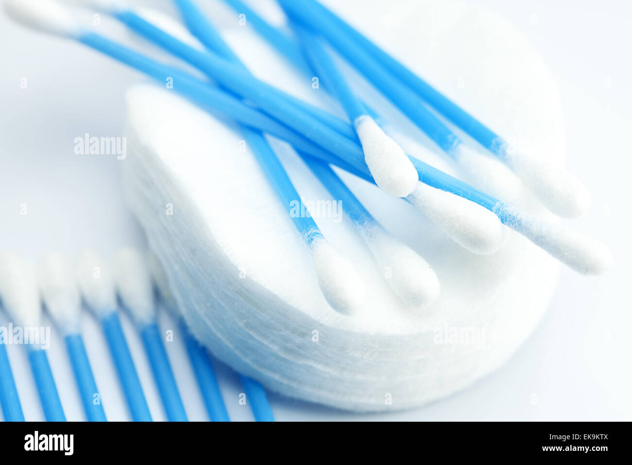 blue cleaning brush and cotton pads isolated on white Stock Photo - Alamy