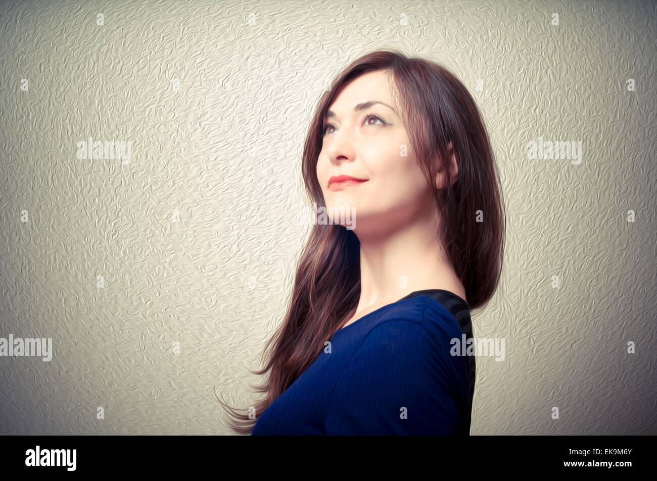 portrait of beautiful girl with long hair and blue sweater Stock Photo ...