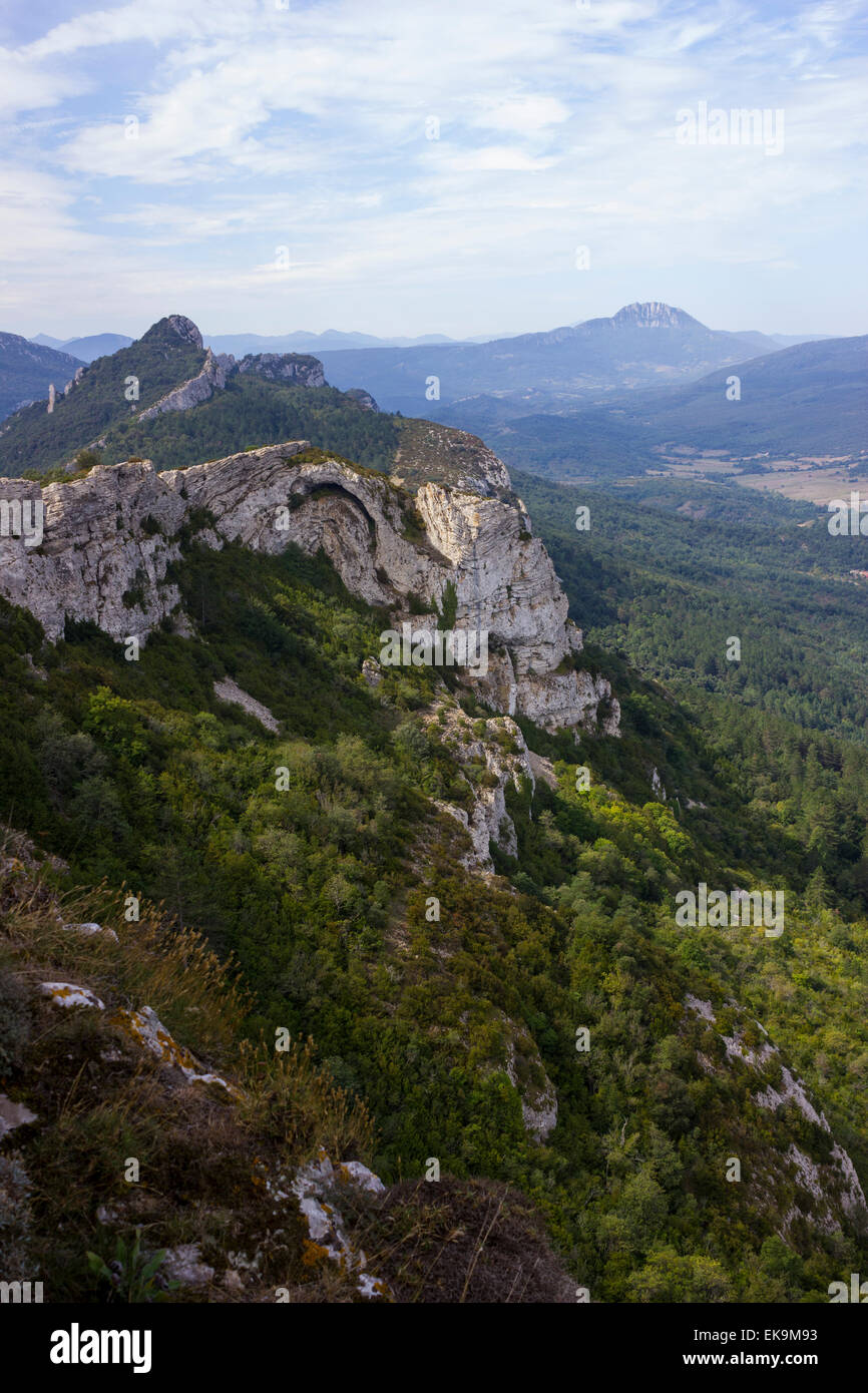 The Pech de Bugarach, seen on the horizon from the Chateau de Peyrepertuse, Pyrenees, Southern France Stock Photo