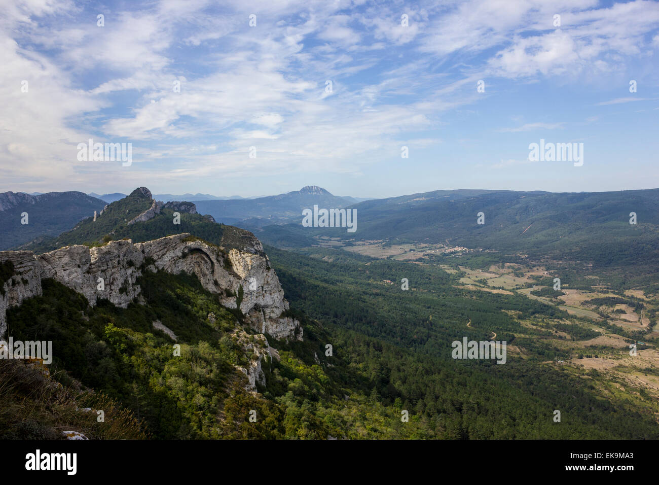 The Pech de Bugarach, seen on the horizon from the Chateau de Peyrepertuse, Pyrenees, Southern France Stock Photo