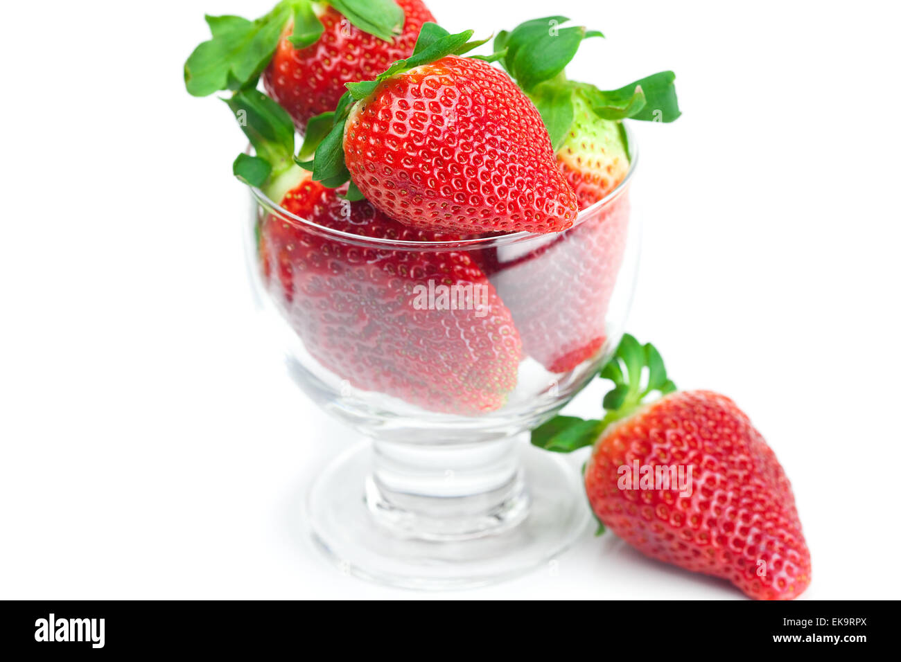 big juicy red ripe strawberries in a glass bowl isolated on whit Stock ...