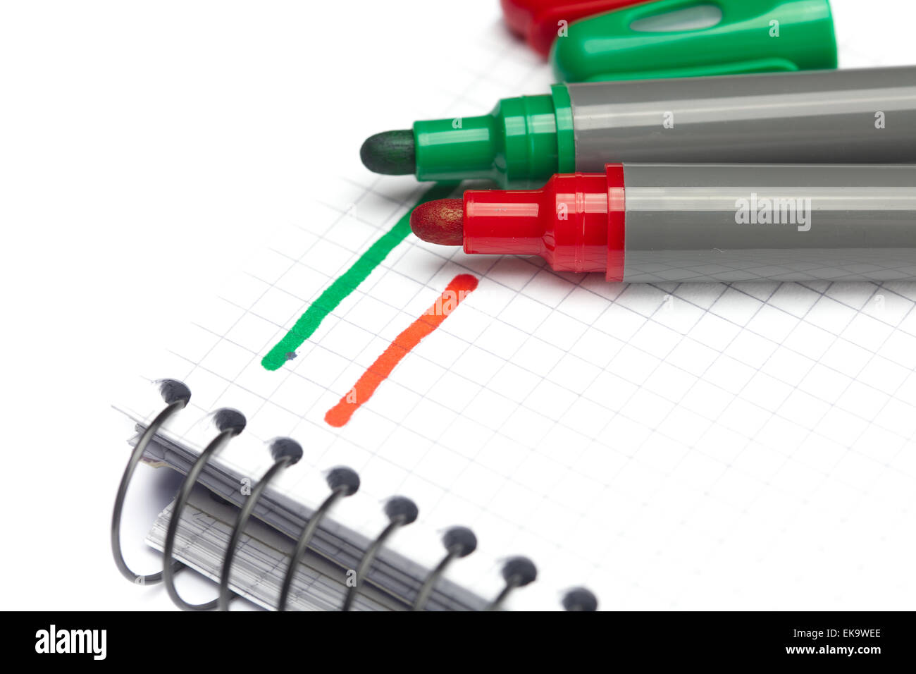 colored markers and a notebook isolated on white Stock Photo - Alamy