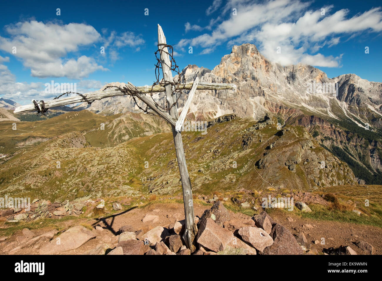 Cavallazza mountain (the Lagorai massif). On top the cross of the First World War. In the background the Pale di San Martino massif. Italy. Europe. Stock Photo
