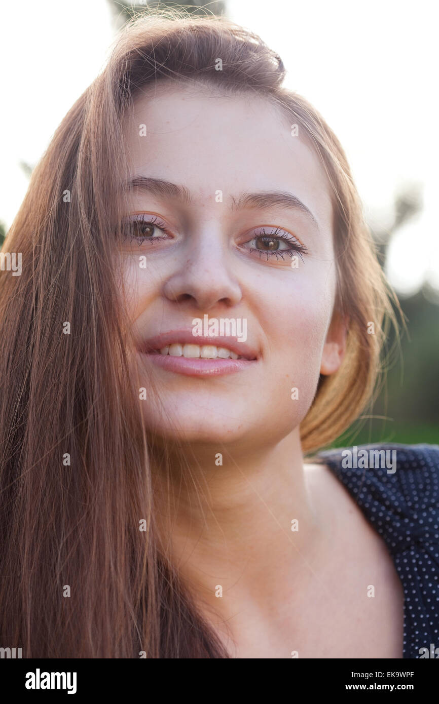 portrait of a beautiful young woman outdoor Stock Photo - Alamy