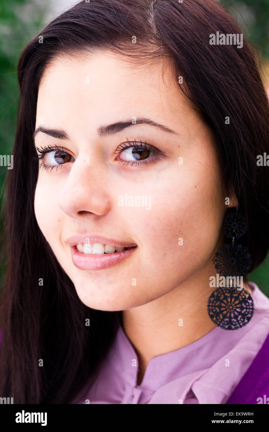 portrait of a beautiful young woman outdoor Stock Photo - Alamy