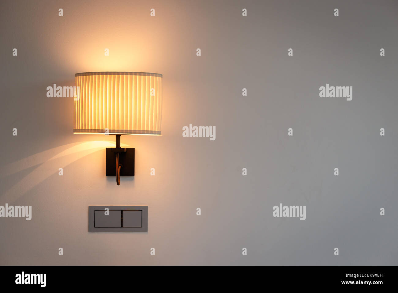 Wall lamp in bedroom Stock Photo Alamy