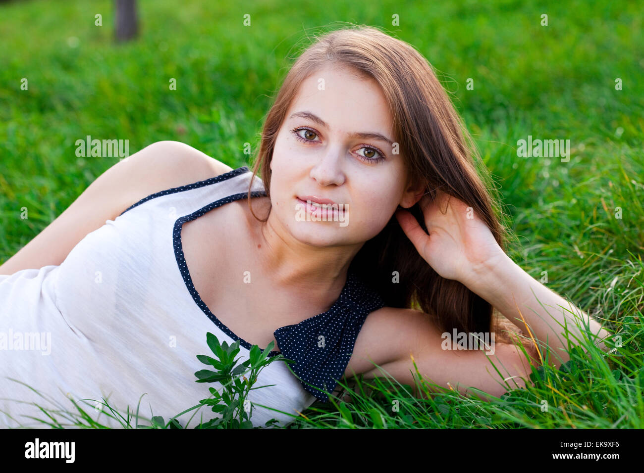 portrait of a beautiful young woman outdoor Stock Photo - Alamy