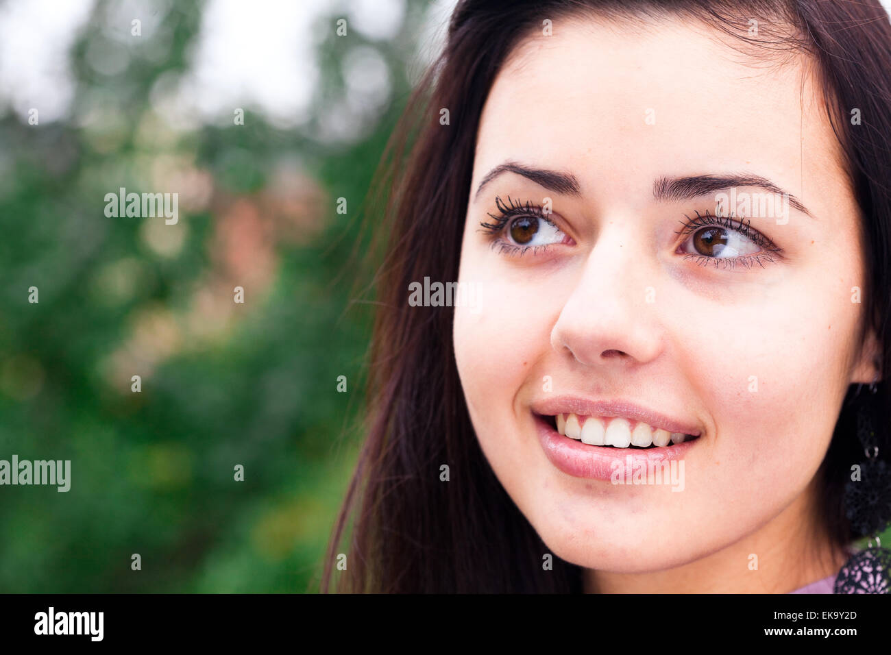 portrait of a beautiful young woman outdoor Stock Photo - Alamy