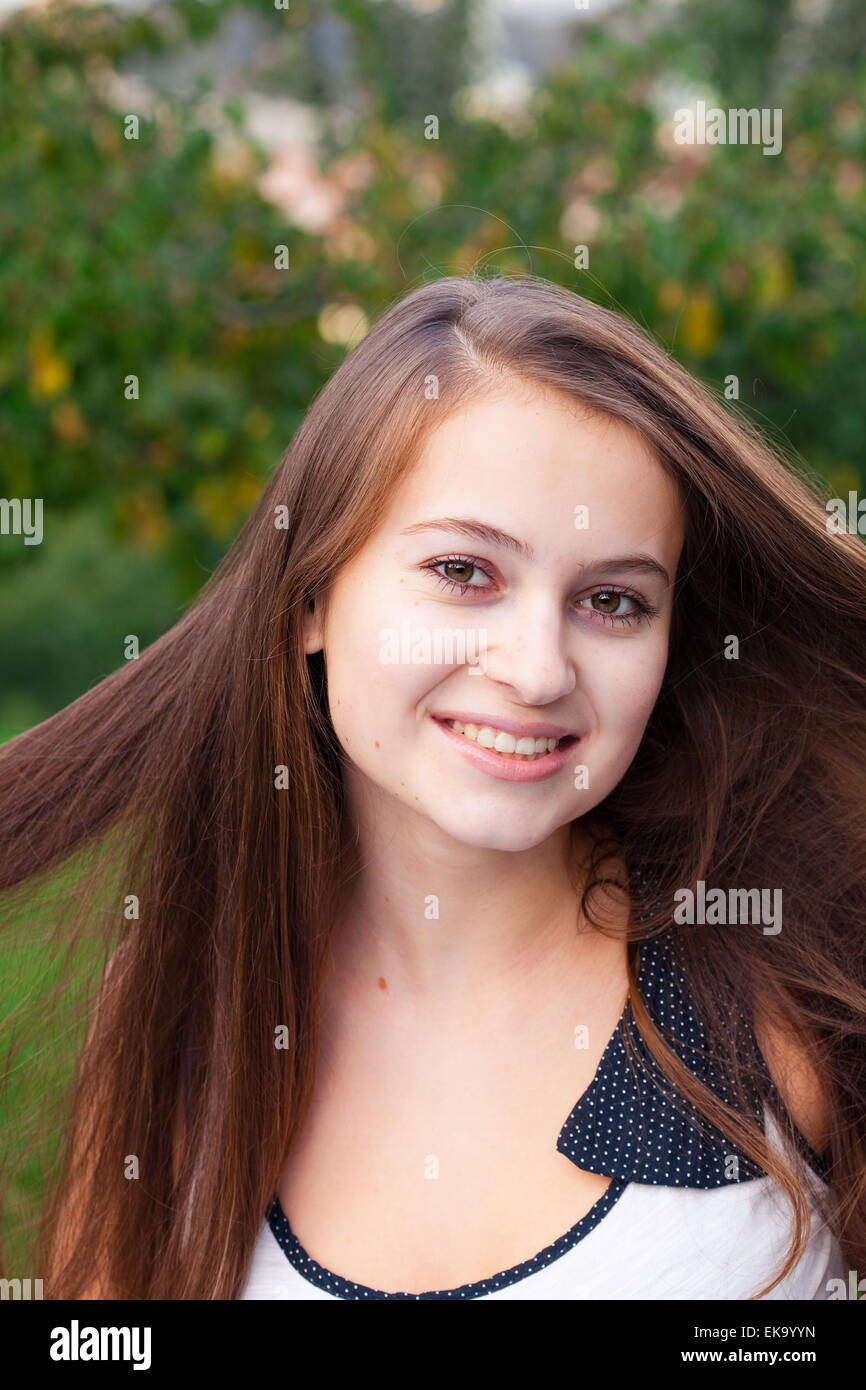 portrait of a beautiful young woman outdoor Stock Photo - Alamy