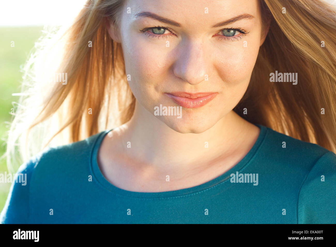portrait of a beautiful young woman outdoor Stock Photo - Alamy