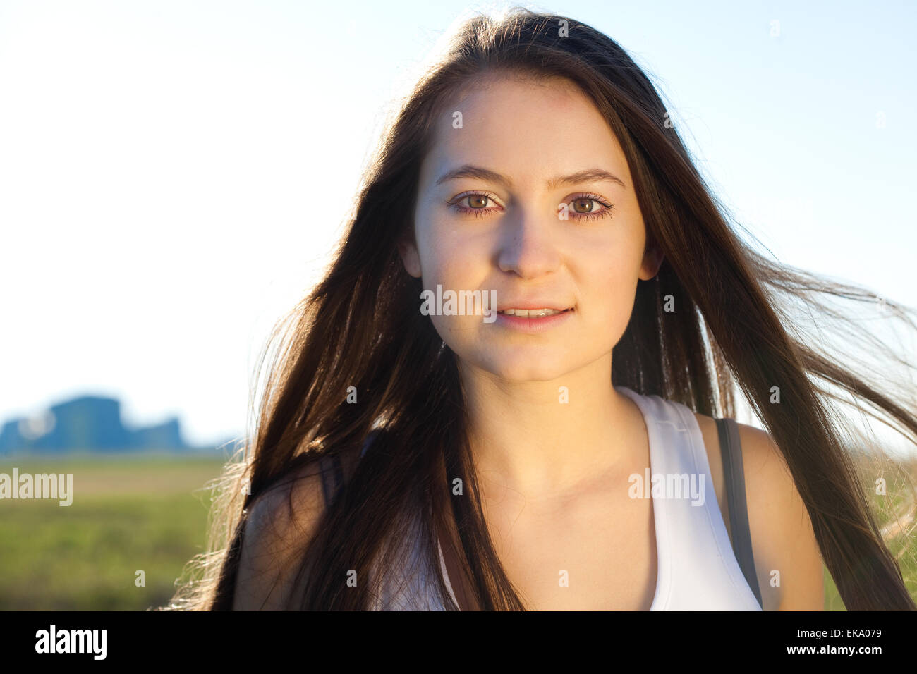 portrait of a beautiful young woman outdoor Stock Photo - Alamy