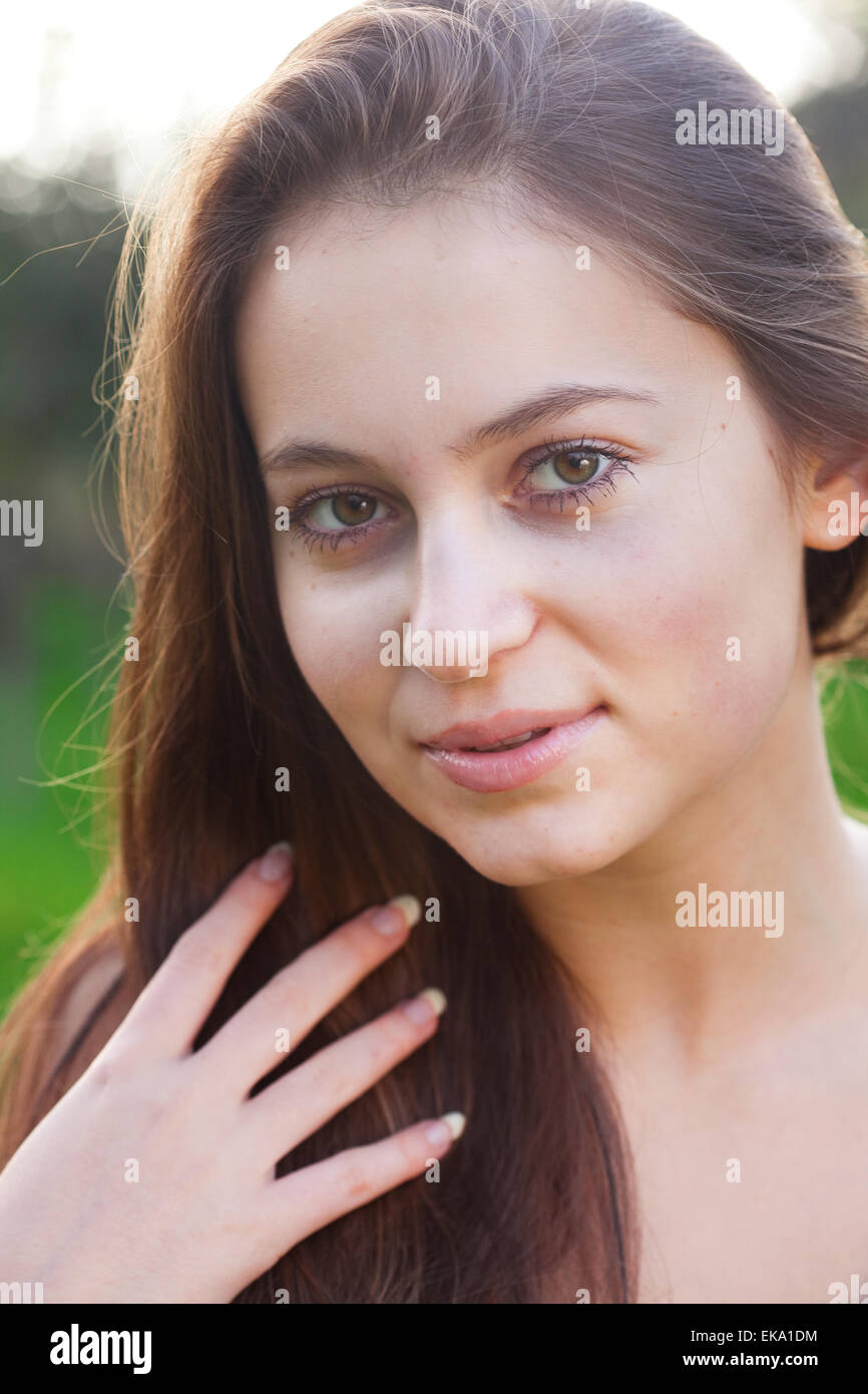 portrait of a beautiful young woman outdoor Stock Photo - Alamy