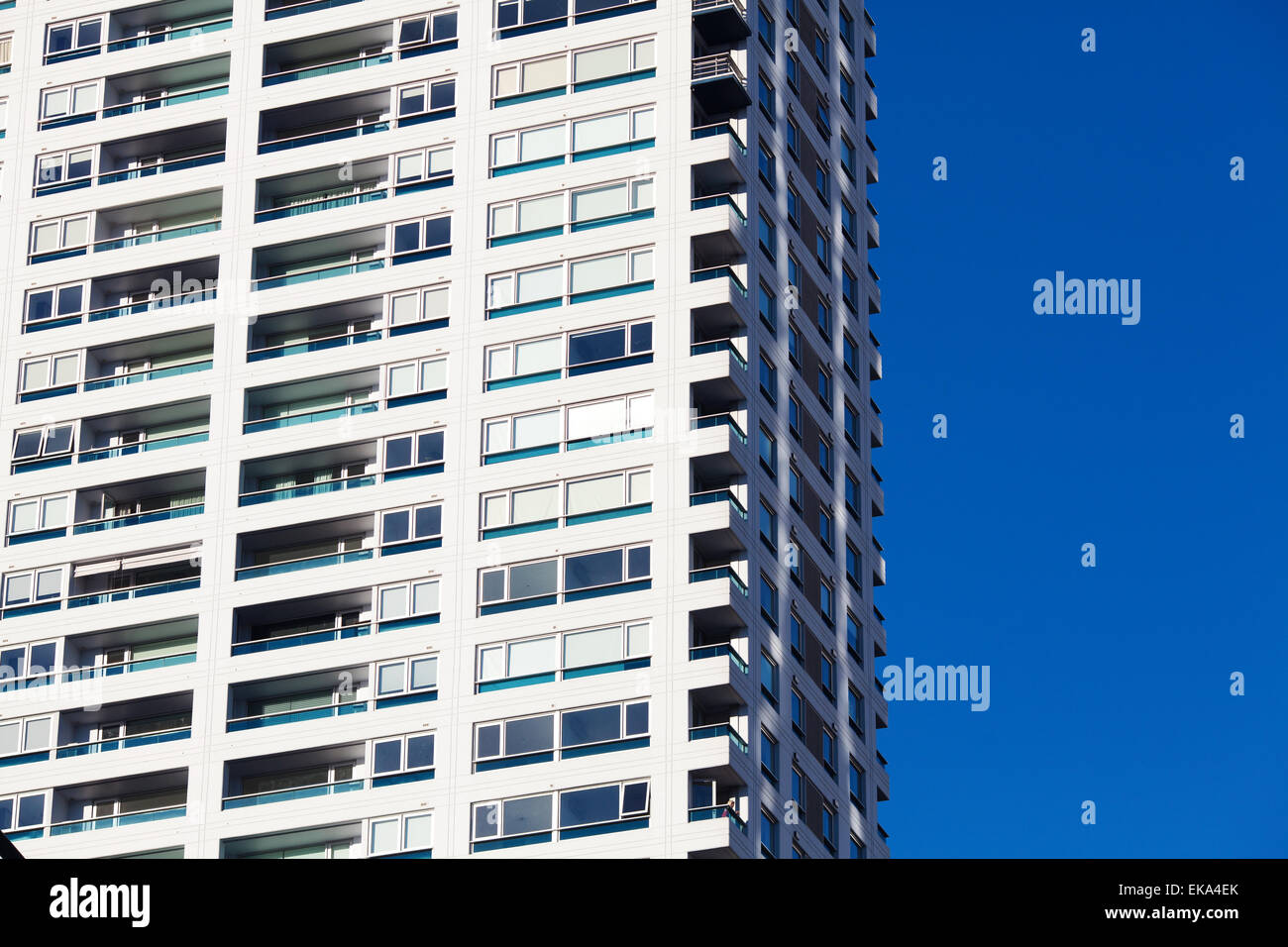 Beautiful modern office building against the blue sky Stock Photo - Alamy