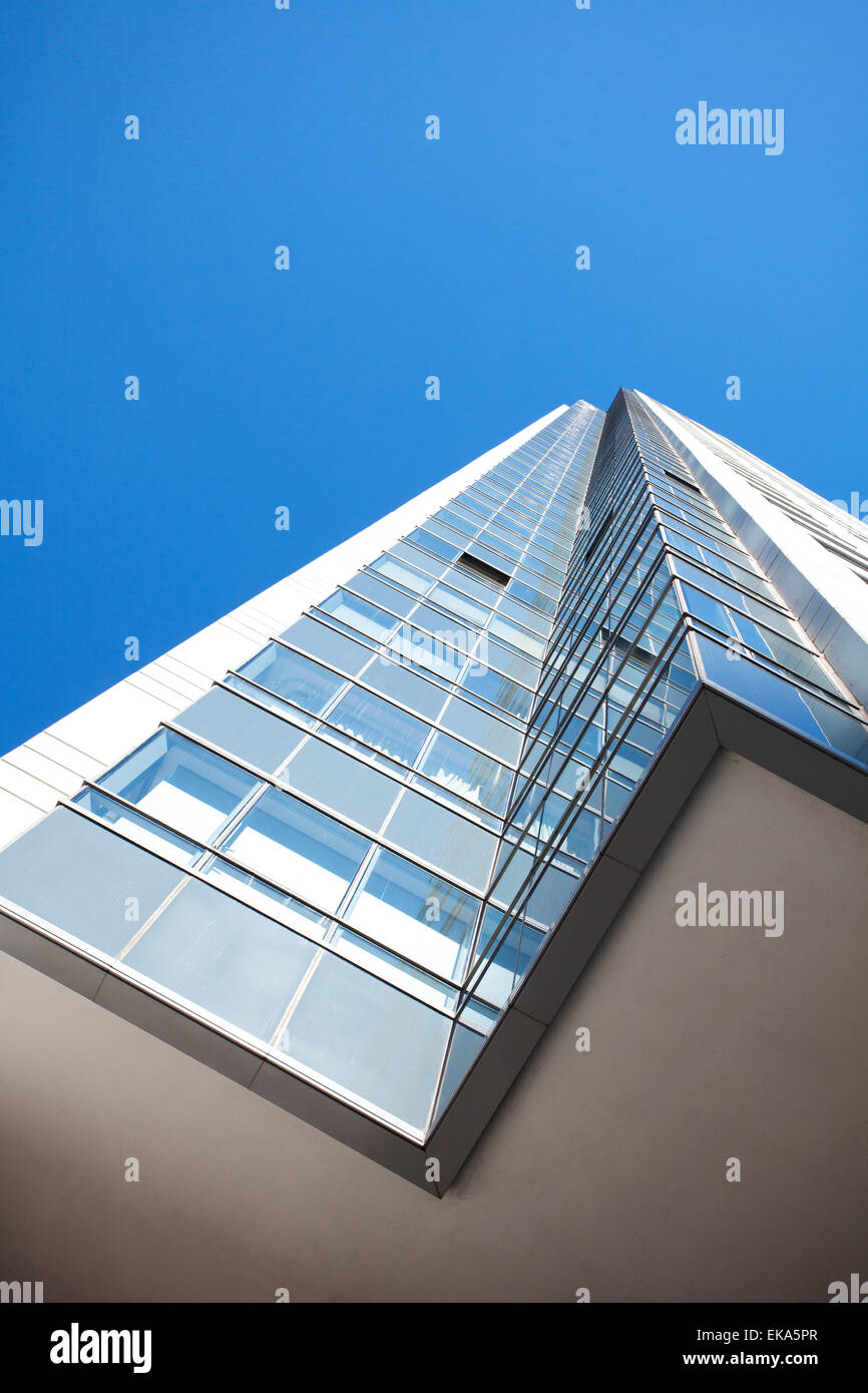 Beautiful modern office building against the blue sky Stock Photo - Alamy