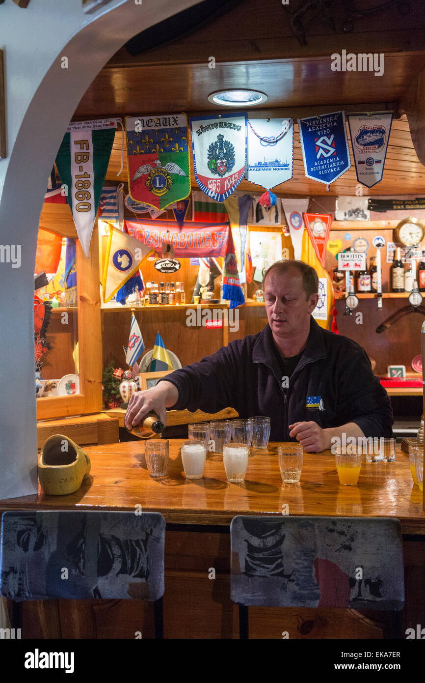 Faraday bar and barman, Vernadsky Research Base,  Galindez Island, Argentine Islands, Antarctica Stock Photo