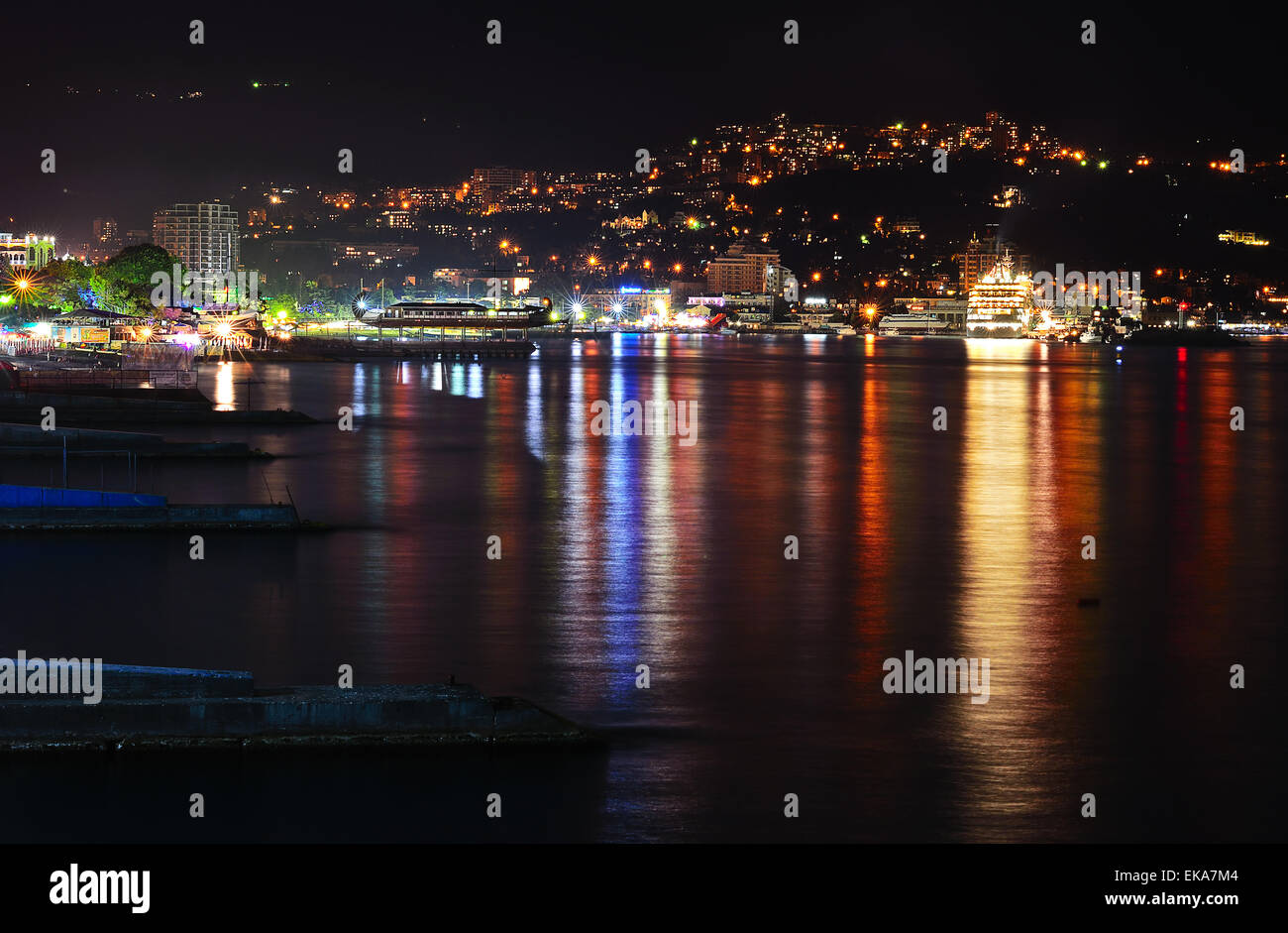 Mountains city at night. Black sea in Crimea Stock Photo