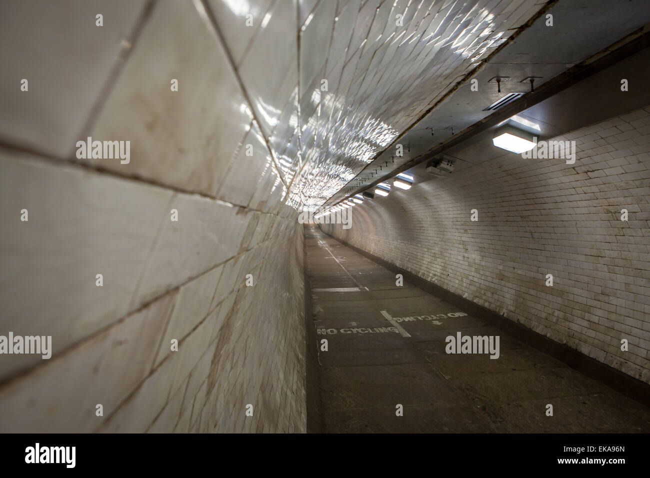 Greenwich foot tunnel is a pedestrian tunnel crossing underneath The Thames River, London Stock Photo