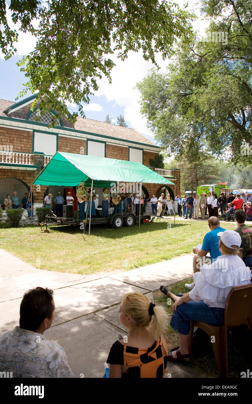 Visitors at the annual Fort Stanton Live! celebration enjoy the Flying J Wranglers music group, near Lincoln, NM, USA Stock Photo