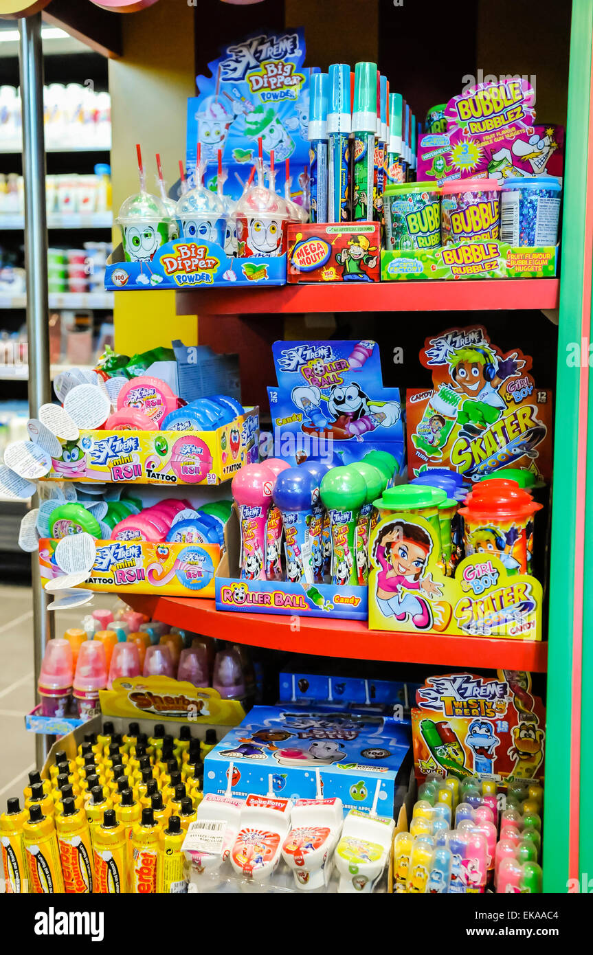 Children's sweets on sale in a motorway service station shop Stock Photo