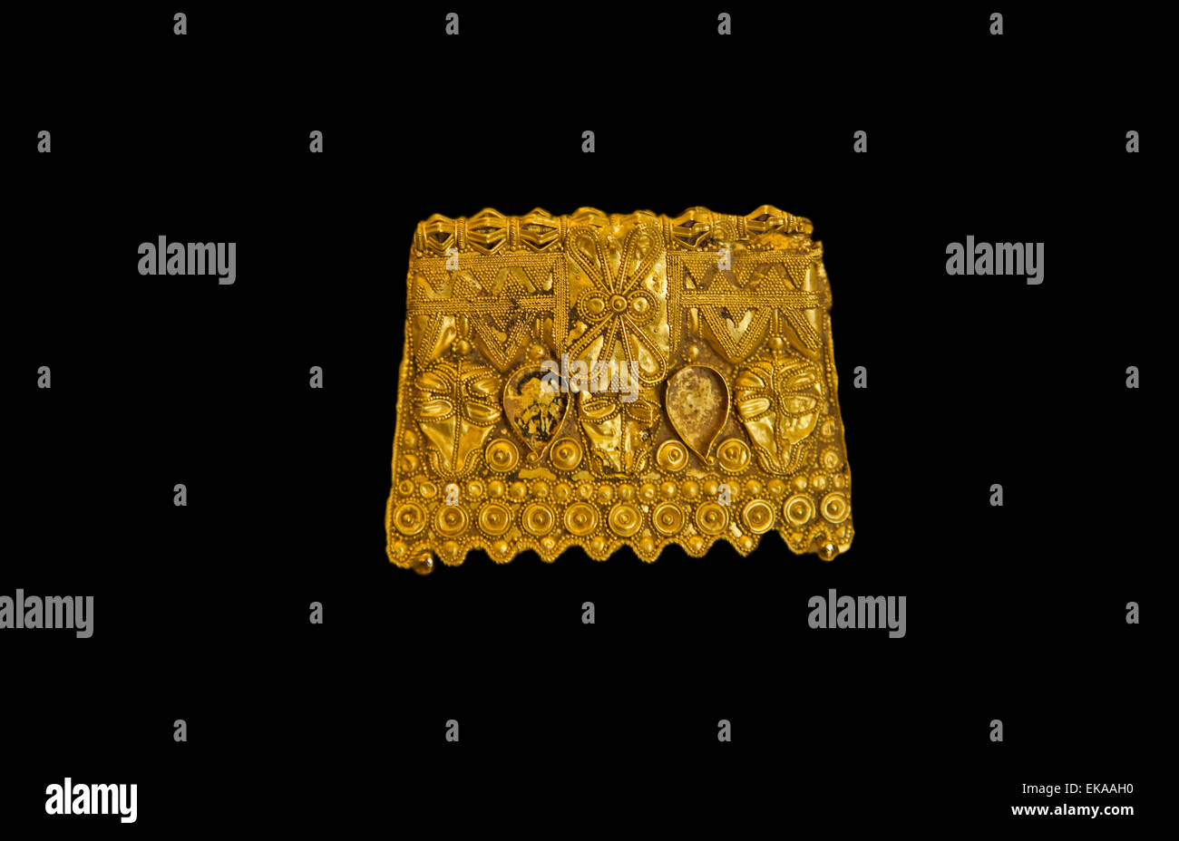 Golden lusitan ear ring isolated over black background made by Lusitanians  in the 6th century BC, people placed in Badajoz, Spa Stock Photo