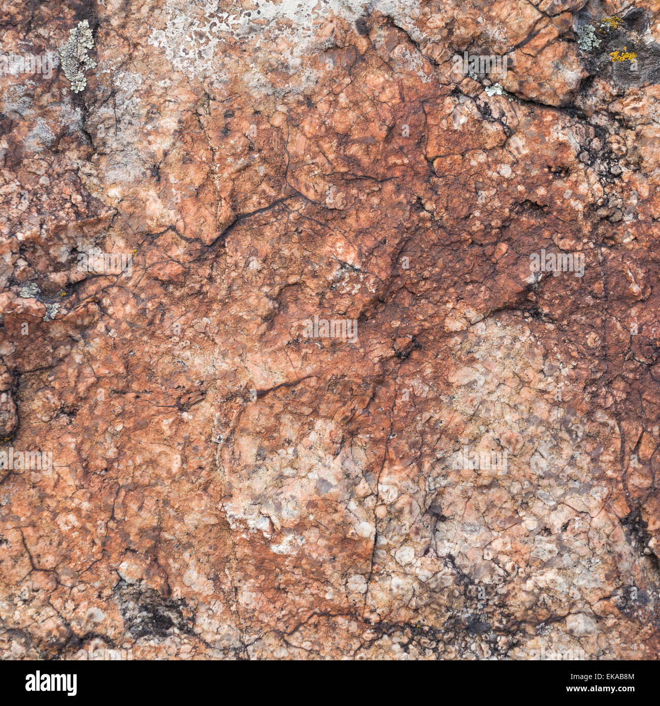 Natural granite stone texture background. Rough and rusty. Close-up