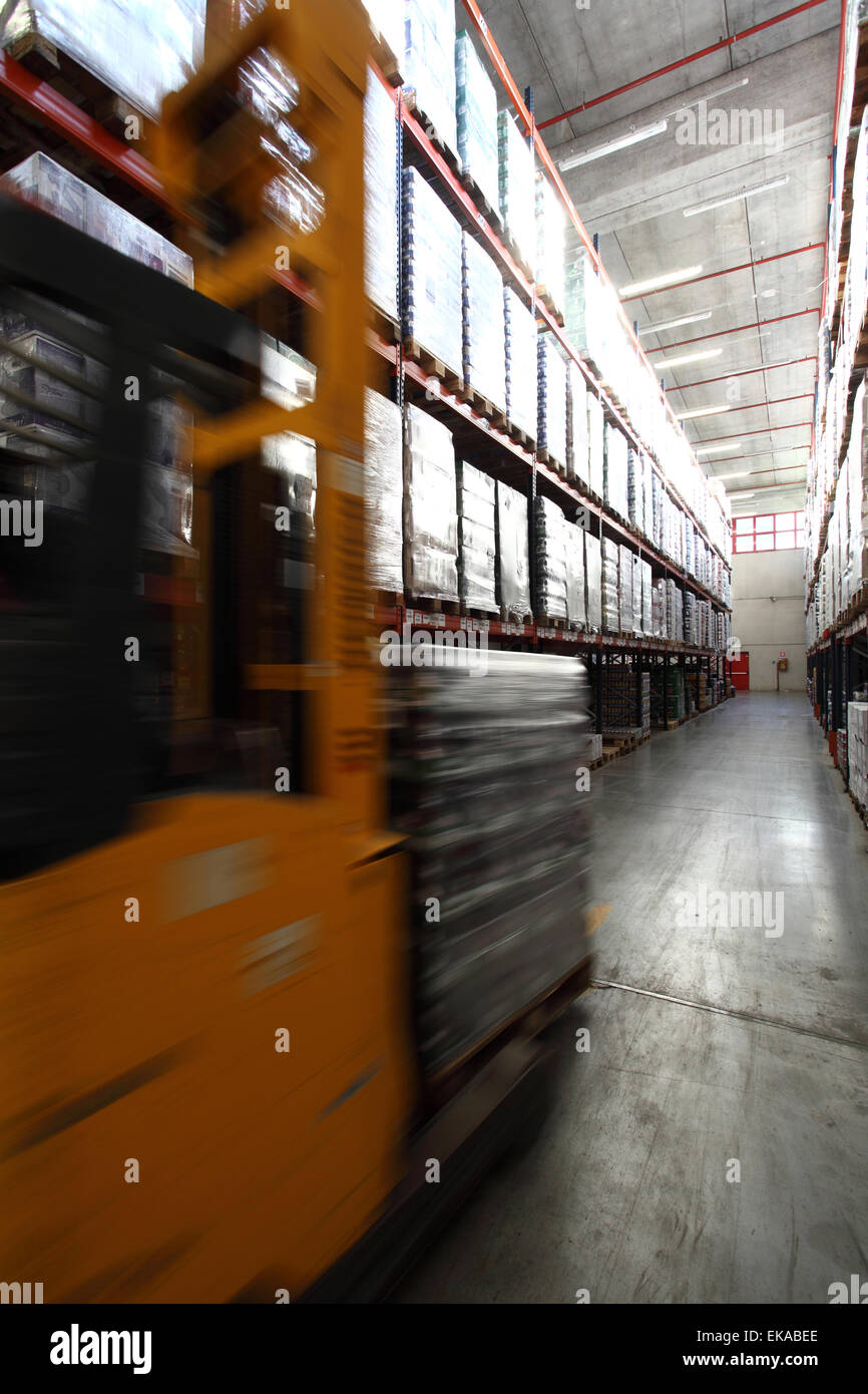 warehouse cargo handling forklift pallet Stock Photo
