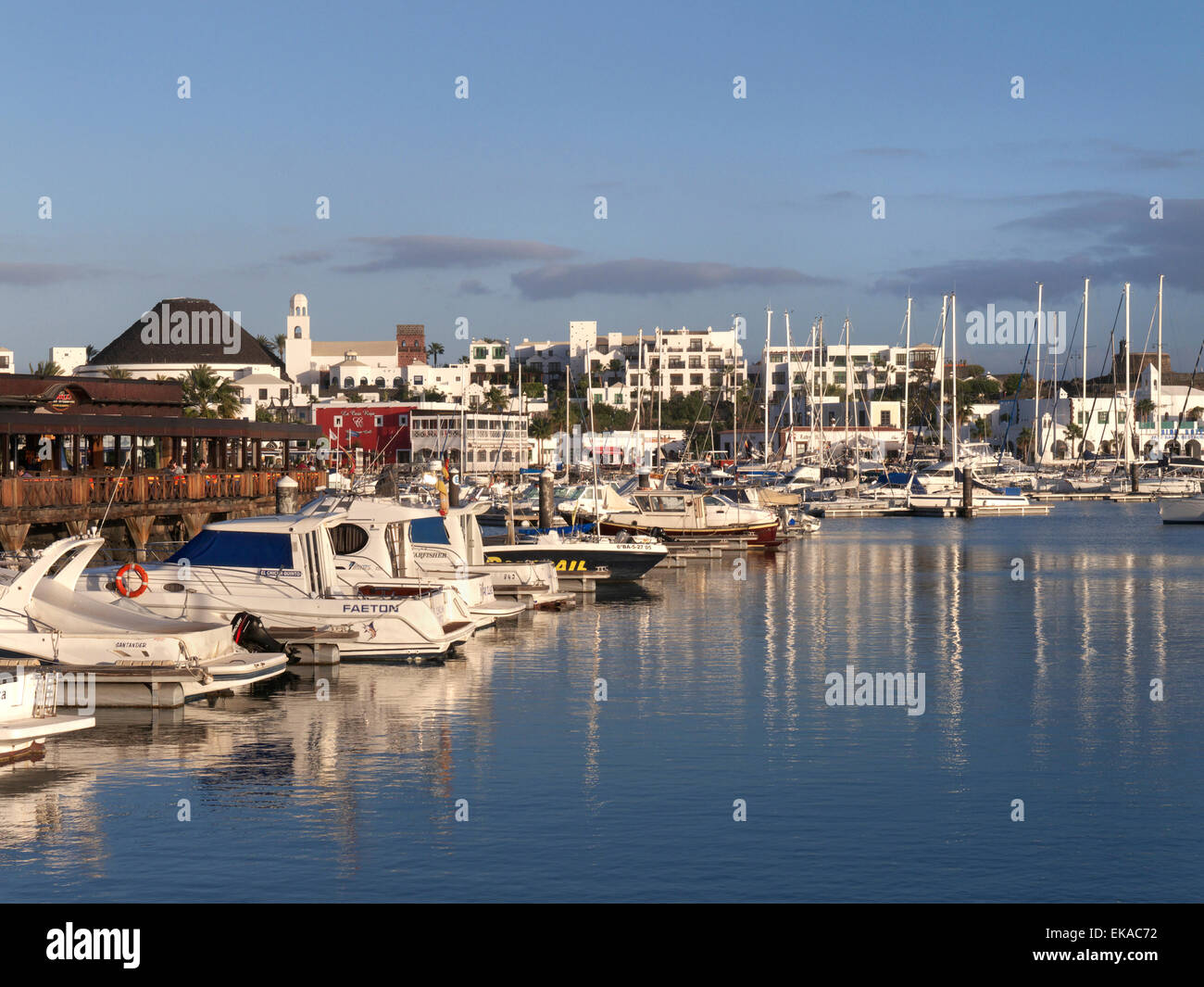Marina Rubicon Lanzarote  luxury marina and restaurants in warm late afternoon sun Lanzarote Canary Islands Spain Stock Photo
