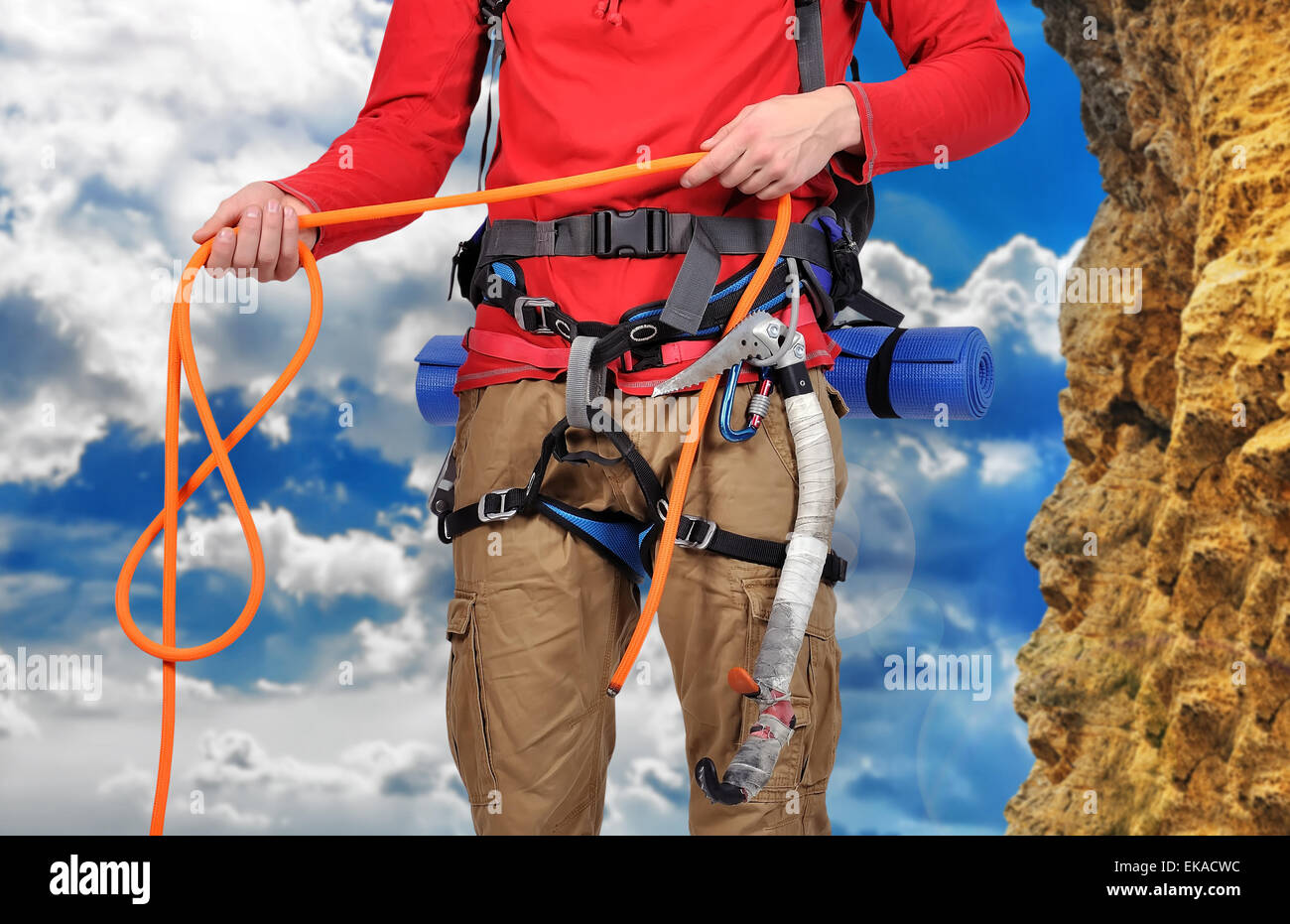 hiker holding rope on mountain background Stock Photo - Alamy