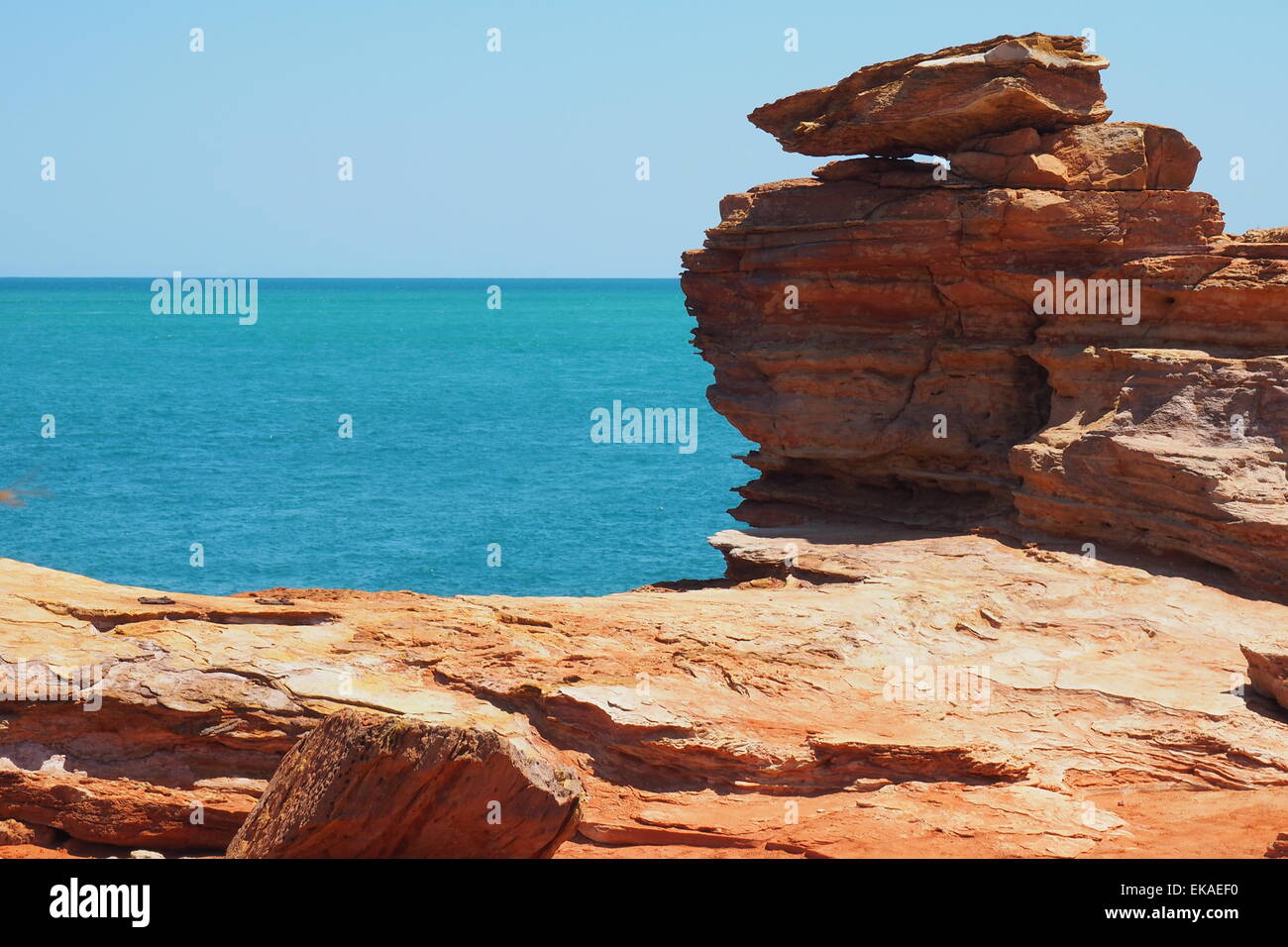 Pindan red rocks at Gantheaume Point Broome, Western Australia. Stock Photo