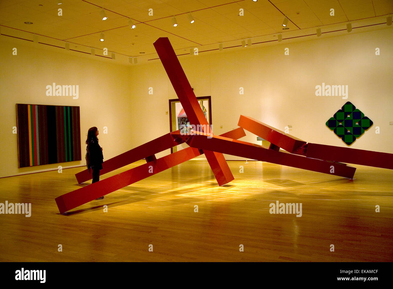 Visitor contemplates a contemporary sculpture at the Oklahoma City