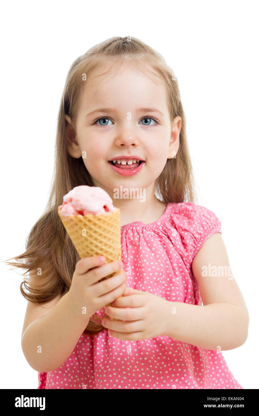 happy kid eating ice cream in studio isolated Stock Photo